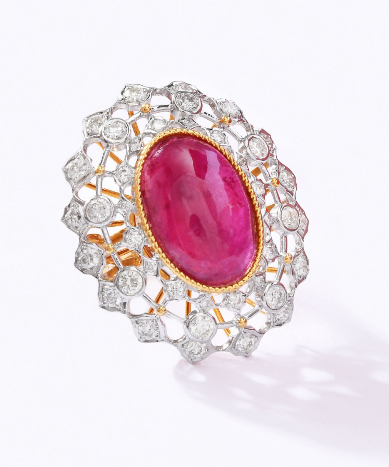 Buy Gold Ring studded with Cabuchon Ruby with Round Diamonds